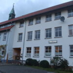 Haus der Begegnung Sandebeck - Blick zum Vincenzhaus QF